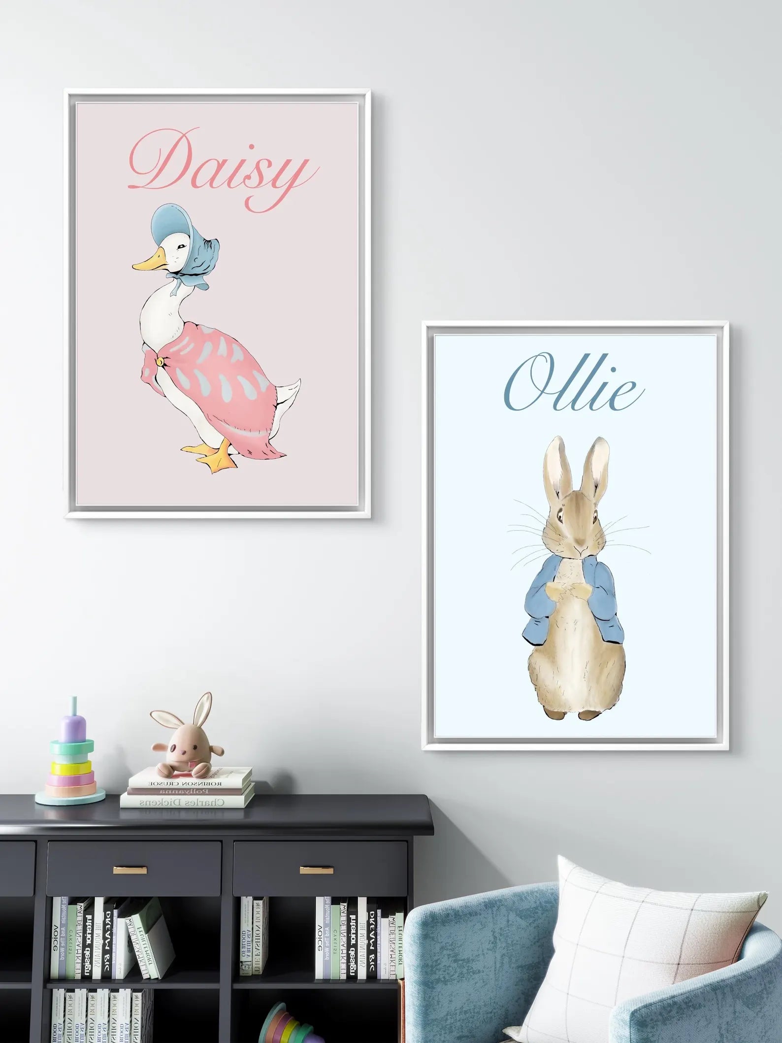Two framed illustrations of a duck and a rabbit on a wall above a bookshelf.